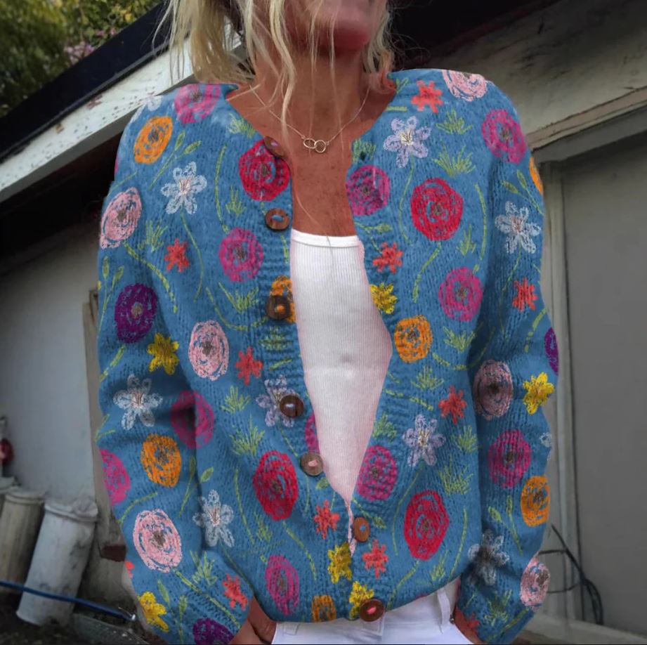 Tilda - blue vest with floral print