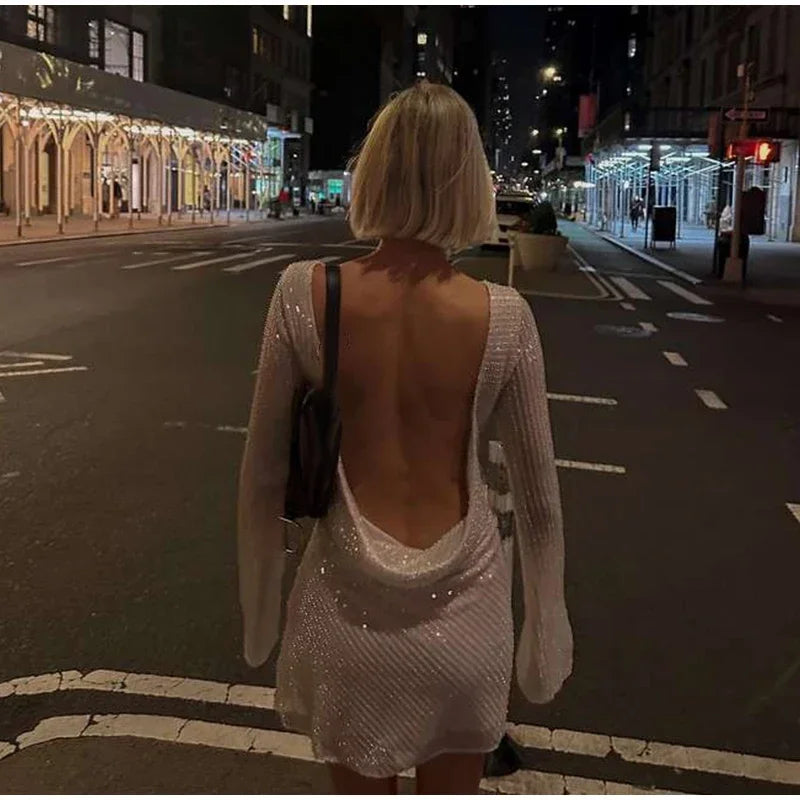 Zerynna™ | Backless shimmering long-sleeved mini dress