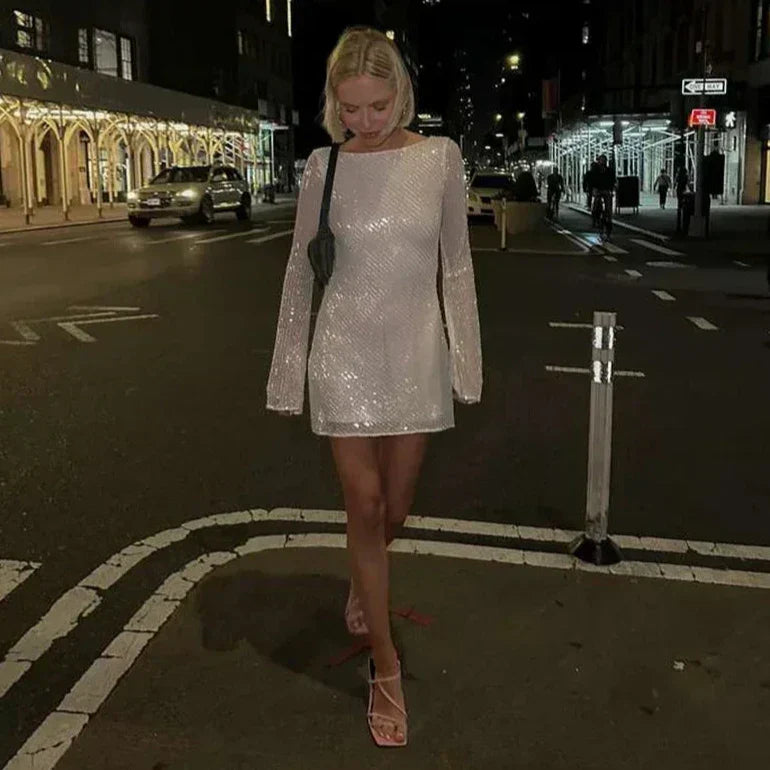 Zerynna™ | Backless shimmering long-sleeved mini dress