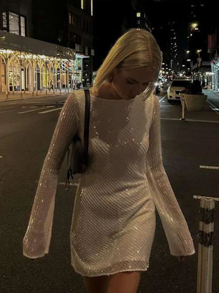 Zerynna™ | Backless shimmering long-sleeved mini dress