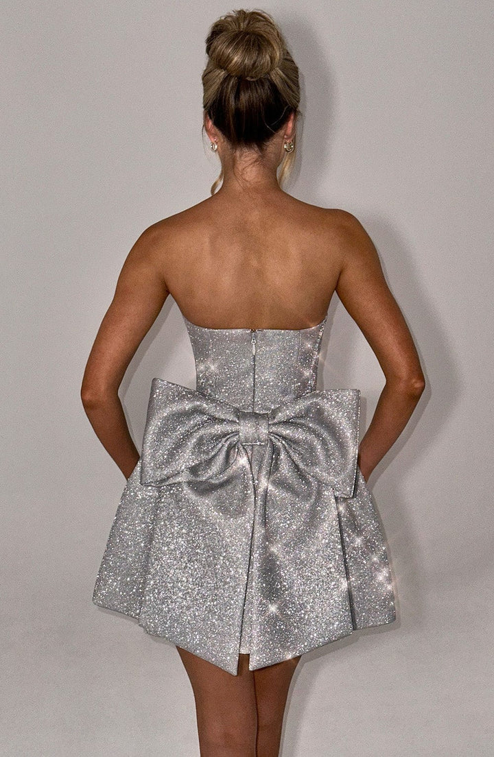 Keziri™ | Glittery mini dress with bow at the back