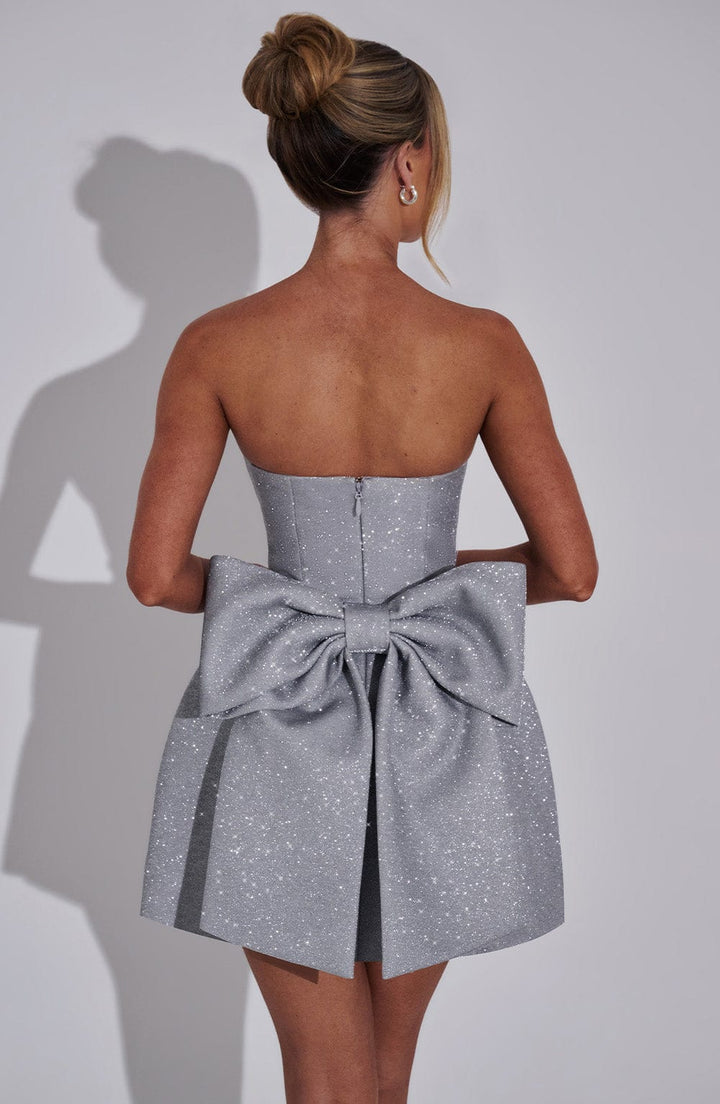 Keziri™ | Glittery mini dress with bow at the back